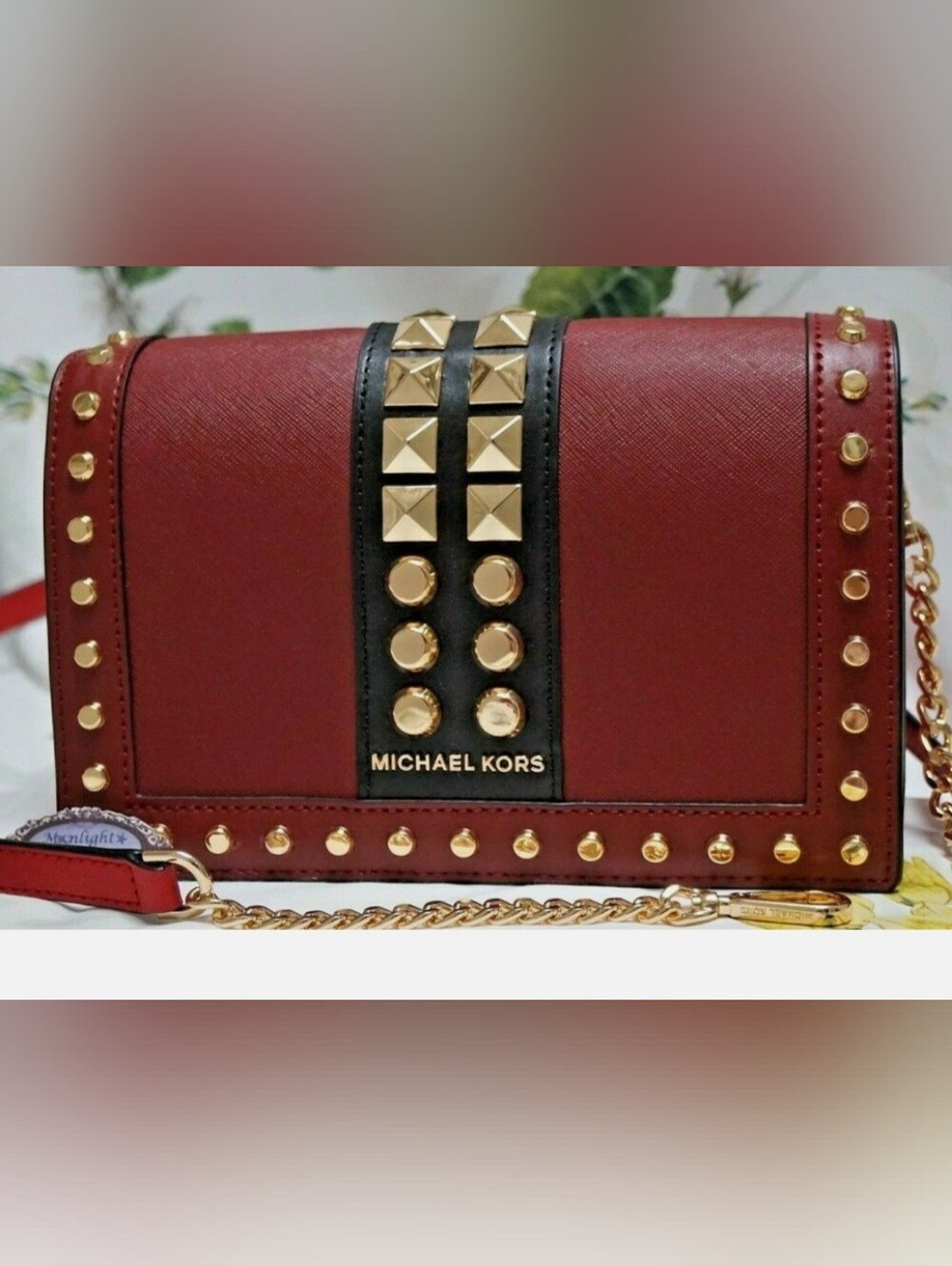 Michael Kors Jet Set Large Studded Saffiano Leather Crossbody Bag in a rich red